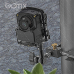 Brinno TLC2020-C time lapse camera placed in green leaves for outdoor use, with waterproof Housing